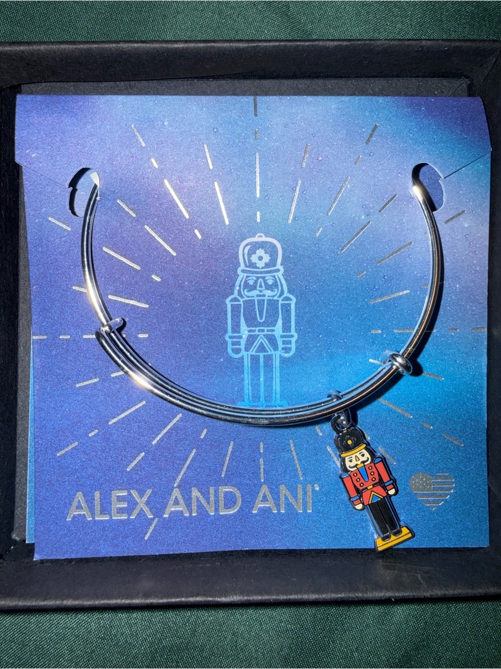 Alex and Ani Silver Bangle with Red and Blue Nutcracker Charm